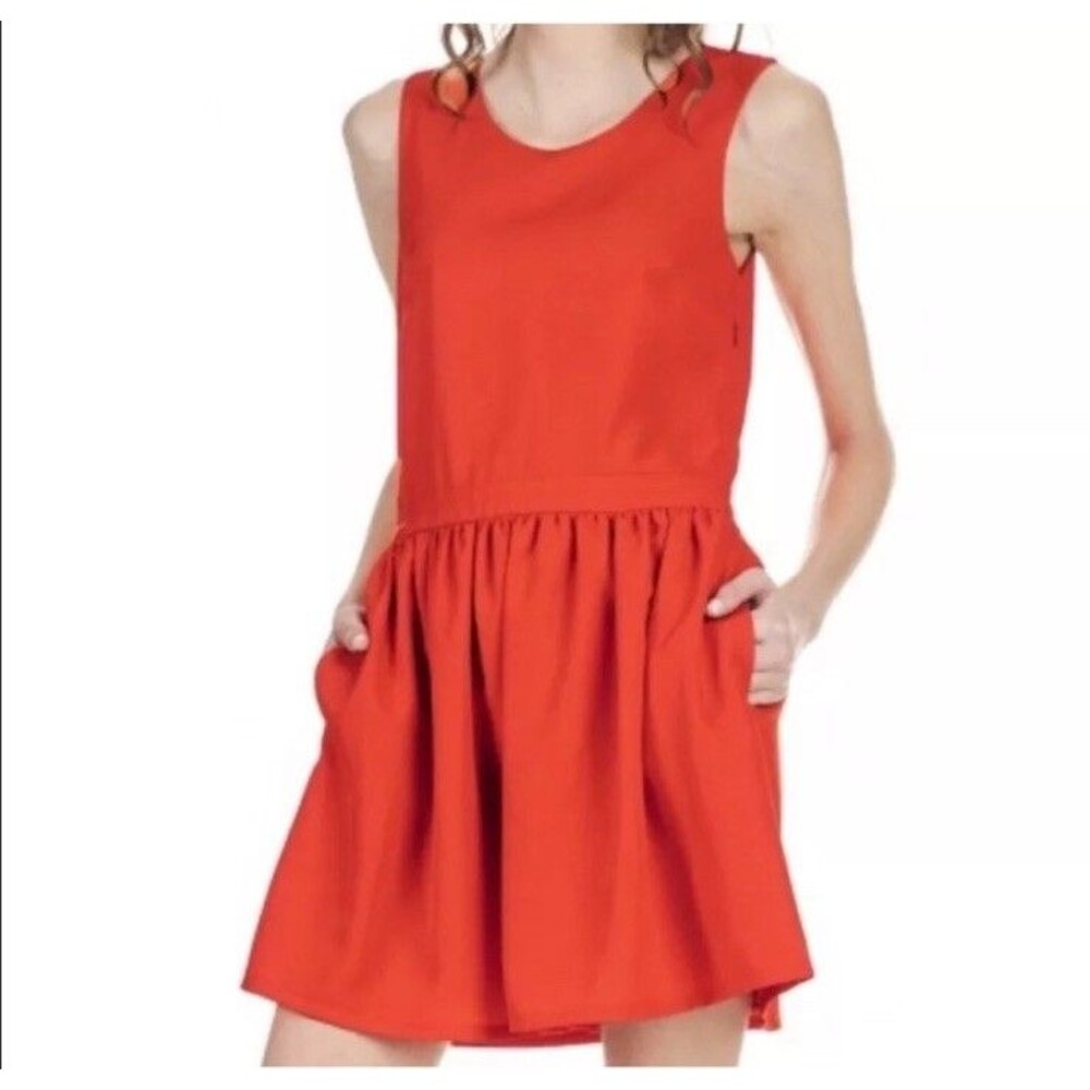 The Korner Bow Back Mini Dress Size XS Pink Cut Out Sleeveless Pocket Evening